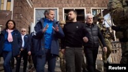 International Atomic Energy Agency Director General Rafael Grossi speaks to Ukraine's President Volodymyr Zelenskyy, in Zaporizhzhia, Ukraine, March 27, 2023. (Ukrainian Presidential Press Service/Handout via Reuters)