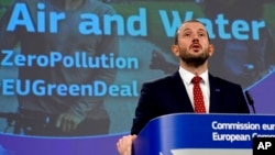 FILE - European Commissioner for Environment and Oceans Virginijus Sinkevicius speaks during a media conference at EU headquarters in Brussels, Oct. 26, 2022.