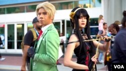 คอสเพลย์เยอร์ที่แต่งตัวตามตัวละครเอเชียในงาน Comic-Con 2023