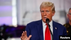 Republican presidential nominee and former U.S. President Donald Trump speaks during a visit to the Livingston County Sheriff's Office in Howell, Michigan, Aug. 20, 2024. 