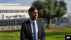 British Prime Minister Rishi Sunak speaks to the media as he arrives at Ben Gurion Airport, near Tel Aviv, Israel, Oct. 19, 2023. 