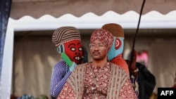 Mouhammad-Nabil Mfonrifoum Mbombo Njoya (C), Sultan King of the Bamouns, sits on his throne while attending the inauguration ceremony of the new Bamoun Kings Museum in Foumban, on April 13, 2024. 
