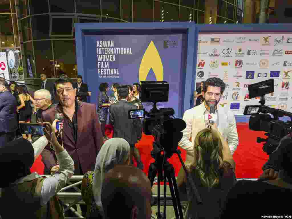 Egyptian actors on the film festival's red carpet show their support for the annual celebration of women-focused productions, including 76 cinematic works, with spotlights on Tunisian, Palestinian and Sudanese films. Aswan, Egypt, April 20, 2024.