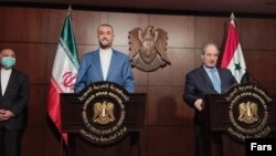 حسین امیرعبداللهیان وزیر امور خارجه جمهوری اسلامی ایران و فیصل المقداد وزیر خارجه سوریه در دمشق، سوریه 