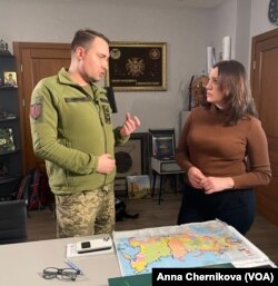 Kyrylo Budanov (left) the head of the Ukrainian military intelligence agency and VOA's Myroslava Gongadze in Kyiv Ukraine.