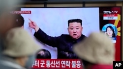 A TV screen is seen reporting North Korea's missile launch with a file image of North Korean leader Kim Jong Un during a news program at the Seoul Railway Station in Seoul, South Korea, April 13, 2023. 