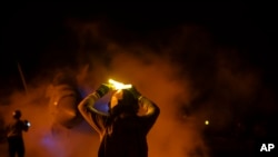 FILE - This image provided by the U.S. Navy shows an aircraft preparing to launch from USS Dwight D. Eisenhower during flight operations in the Red Sea, Jan. 22, 2024.