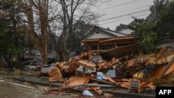 This picture shows damaged homes in the town of Misaki in Suzu city, Ishikawa prefecture on Jan. 7, 2024, after a 7.5 magnitude earthquake struck the Noto region on New Year's Day.