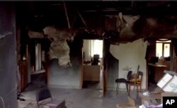 Sebuah bangunan rusak di wilayah Belgorod, Rusia, 22 Mei 2023. (Foto: AP)