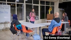 The cast of "English," performed Studio Theatre in Washington, D.C.