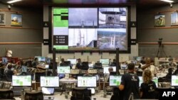 Engineers and managers monitor the parameters of the Ariane 6 launch in The Jupiter Room at The Guiana Space Centre in Kourou, French Guiana, July 9, 2024.