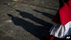 Catholics take part in a reenactment of the Stations of the Cross during the Lenten season at the Metropolitan Cathedral in Managua, Nicaragua, March 17, 2023. 
