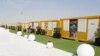 FILE - Cabins line the World Cup fan village, Nov. 10, 2022, in Doha, Qatar. 