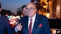 Former Mayor of New York Rudy Giuliani leaves the federal courthouse in Washington, Dec. 14, 2023. 