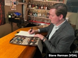 Investment analyst Tony Blair with his collection of fountain pens inside Philadelphia’s historic Pen & Pencil Club on April 12, 2023.