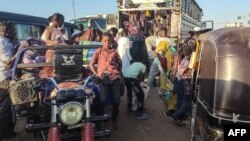 FILE — People displaced by the conflict in Sudan flee Wad Madani, the capital of al-Jazirah state, heading to Gadaref state, Dec. 16, 2023. 