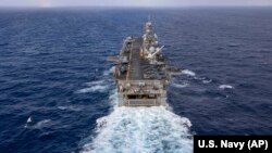 FILE - The Wasp-class amphibious assault ship USS Bataan travels through Atlantic Ocean, July 20, 2023.