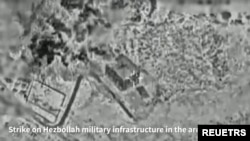 17일 이스라엘 군이 레바논 남부 키암 지역에 위치한 헤즈볼라의 기반시설을 타격했다며 공개한 적외선 촬영 동영상의 한 장면.
