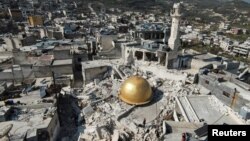 A damaged mosque in the aftermath of a deadly earthquake in rebel-held al-Maland village in Idlib province, Syria, Feb. 24, 2023