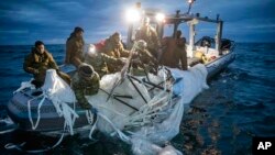 Explosive Ordnance Disposal Group 2 recover a high-altitude surveillance balloon off the coast of Myrtle Beach, S.C., Feb. 5, 2023.