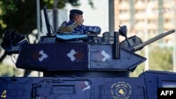 កង​សន្តិសុខ​ជាតិ​អ៊ីរ៉ាក់​យាម​ល្បាត​នៅ​ទីក្រុងបាកដាដ ប្រទេសអ៊ីរ៉ាក់ កាលពីថ្ងៃទី២៦ ខែធ្នូ ឆ្នាំ២០២៣។