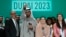 From left, U.N. Climate Chief Simon Stiell, COP28 President Sultan al-Jaber and chief COP28 negotiator for the United Arab Emirates Hana Al-Hashimi pose for a photo at the end of the COP28 U.N. Climate Summit in Dubai, UAE, Dec. 13, 2023.