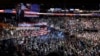 FILE - Participants stand for the signing of the national anthem before the start of the second day session of the Democratic National Convention in Philadelphia, July 26, 2016.