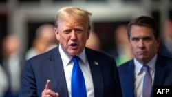 FILE - Former U.S. president and then-Republican presidential candidate Donald Trump speaks to the press after he was convicted in his criminal trial at Manhattan Criminal Court in New York City, on May 30, 2024. 