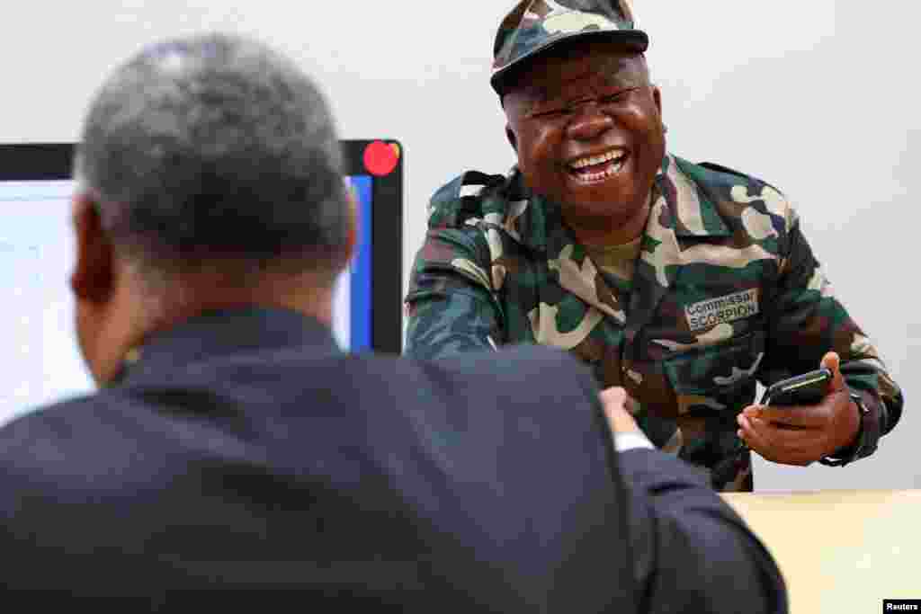 Former South African finance minister, Des van Rooyen, reacts ahead of his swearing-in ceremony as a member of uMkhonto we Sizwe (MK) party into the South African parliament in Cape Town, South Africa.