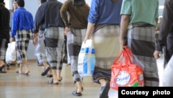 The International Committee of the Red Cross assists some of the 318 detainees who were repatriated to Yemen and Saudi Arabia, April 14, 2023.