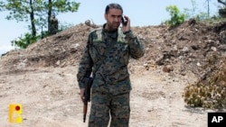 ჰეზბოლას სამხედრო მედიის მიერ გამოქვეყნებულ ამ დაუთარიღებელი სურათზე ჩანს "ჰეზბოლას" უფროსი მეთაური ვისამ ტავილი, რომელიც სამხრეთ ლიბანის სოფელ ხერბეტ სელემში, 2024 წლის 8 იანვარს მოკლეს. 