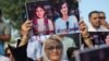 Dozens protest Iraq drone strike that killed two journalists 