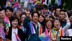 Taiwan's Vice President Lai Ching-te marches during the annual Taiwan's Pride parade in Taipei, Taiwan, Oct. 28, 2023.
