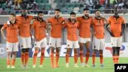 Le RS Berkane avant le match contre les Sud-Africains des Pirates d'Orlando Pirates en 2022. (Photo by Pius Utomi EKPEI / AFP)