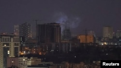 Smoke rises in the sky over the city after a Russian missile strike, amid Russia's attack on Ukraine, in Kyiv, March 24, 2024. 