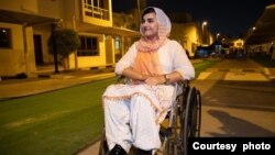 Breshna Musazai, who was injured in an attack at her university in Afghanistan in 2016, fled her country two days after the Taliban took control in 2021. Here she is in Qatar in 2022, awaiting her U.S. resettlement case. (Photo courtesy of Breshna Musazai)
