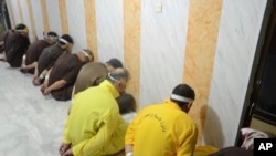 Wasu da aka kama a taron.