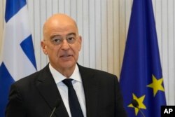 FILE - Greek Foreign Minister Nikos Dendias speaks during a press conference at the Presidential palace in capital Nicosia, Cyprus, March 31, 2023.
