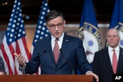 Speaker of the House Mike Johnson, R-La., meets with reporters after a closed-door Republican strategy session, at the Capitol in Washington, June 12, 2024.