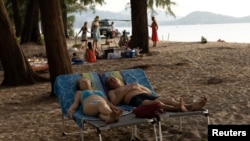 Russian tourists relax in Phuket, Thailand, Dec. 25, 2022.
