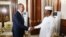 Russia's Foreign Minister Sergei Lavrov shakes hands with Chad's President Mahamat Idriss Deby during a meeting in N'djamena, Chad, June 5, 2024. 