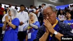 People attend Holy Mass celebrated by Pope Francis at Steppe Arena, during his Apostolic Journey in Ulaanbaatar, Sept. 3, 2023