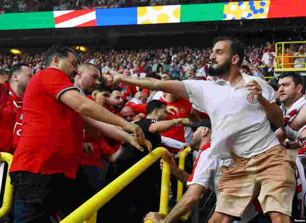 Turkey and Georgia fans clash before the Euro 2024 Group F match between Turkey and Georgia at the Dortmund BVB Stadion, Dortmund, Germany.