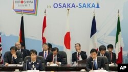Foreign Minister Yoko Kamikawa, left, and Yasutoshi Nishimura, right, the Japanese minister in charge of trade and the economy, attend a G7 Trade Ministers' Meeting in Osaka, western Japan, Oct. 29, 2023. 