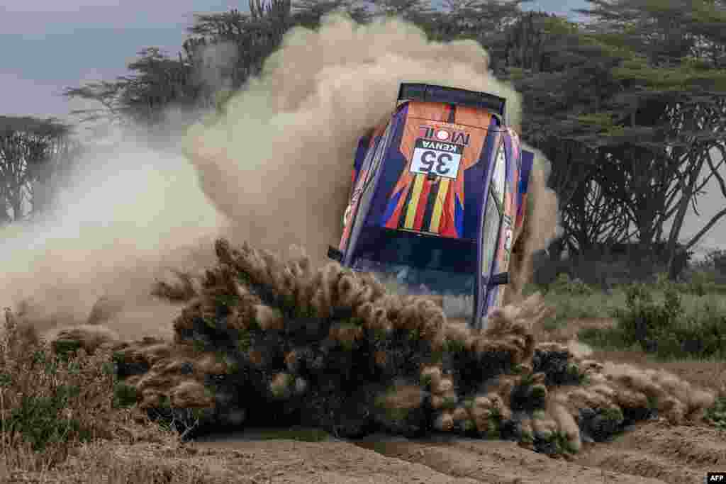 Tanzanian driver Yasin Nasser loses control of his Ford Fiesta Mk II with Ugandan co-driver Ali Katumba during the World Rally Championship (WRC) Safari Rally Kenya Special Stage 7 (SS7) in Naivasha, March 29, 2024.