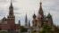 FILE - A general view on the Spasskaya tower of the Kremlin and St. Basil's Cathedral in Moscow, May 16, 2024. 