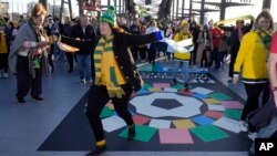 People participate during a Unity Celebration event on the Sydney Harbour Bridge in Sydney, June 25, 2023, as part of the lead up to the FIFA Women's World Cup soccer tournament that will be held beginning July 20 in Australia and New Zealand.