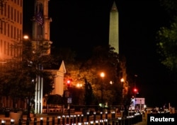 The U.S. Secret Service and other law enforcement agencies investigate a rented box truck that crashed into security barriers at Lafayette Park across from the White House in Washington, May 22, 2023.