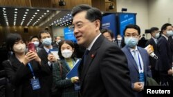 Chinese Foreign Minister Qin Gang walks after delivering a keynote speech during the "Lanting Forum" in Beijing, Feb. 21, 2023.