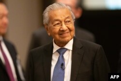 Mantan Perdana Menteri Malaysia Mahathir Mohamad saat menghadirei Nikkei Forum "Future of Asia" di Tokyo, 26 Mei 2023. (Yuichi YAMAZAKI/AFP)